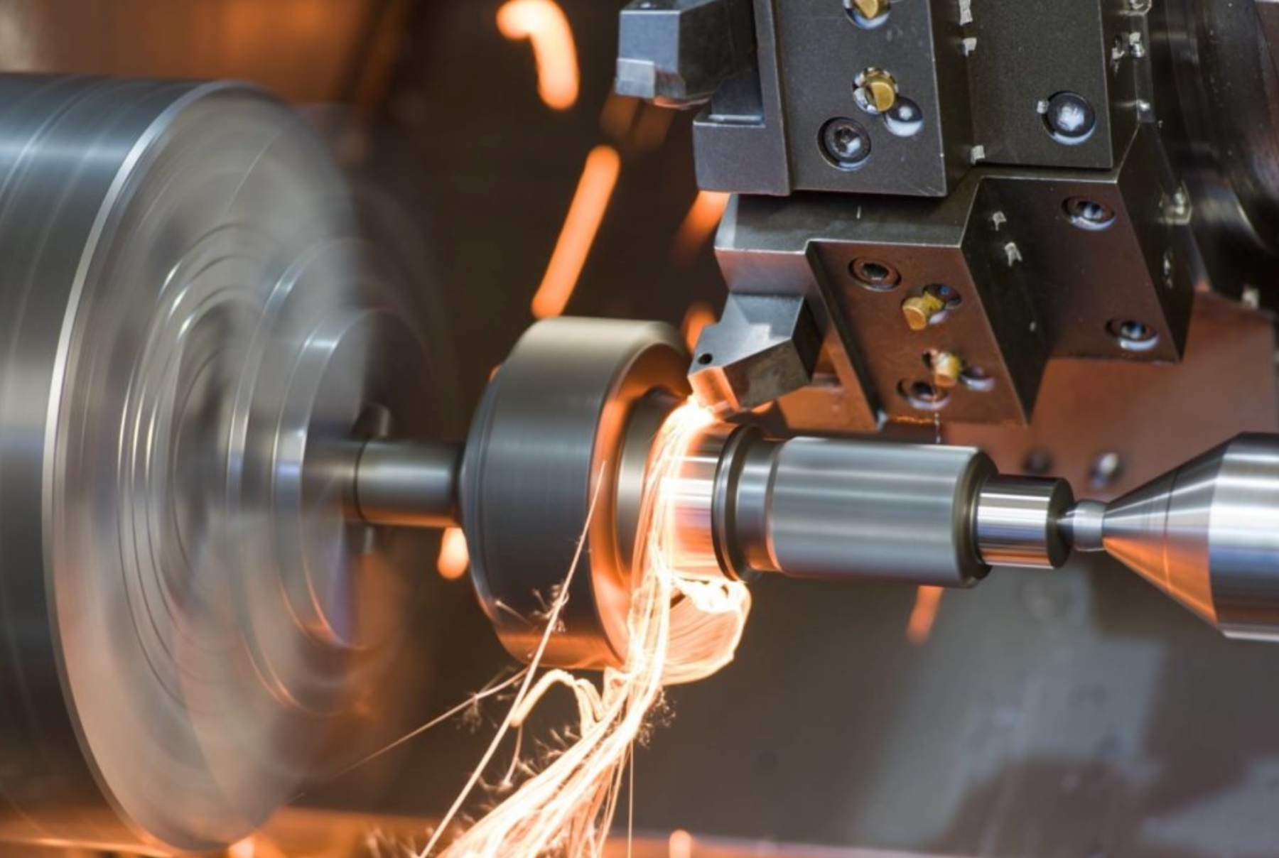 Carbide insert hard turning a hardened steel part on a lathe